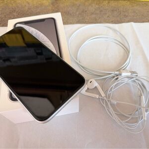 Apple iPhone with White Earphones